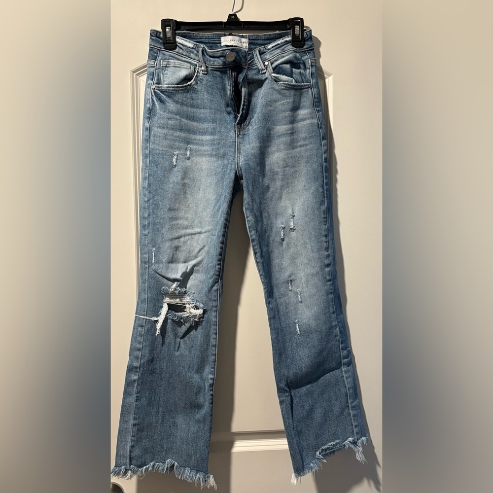 Trendy Distressed Flare Jeans in Light Blue
